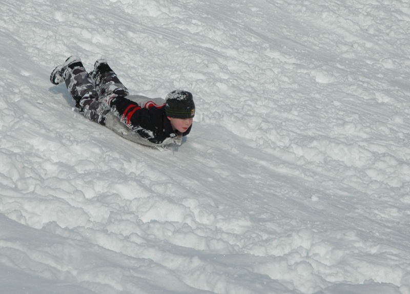 DSC_0020.jpg - Erik sliding without a sled!!