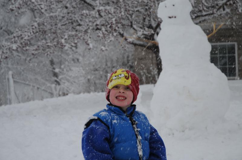 snowman.jpg - Erik playing in the snow