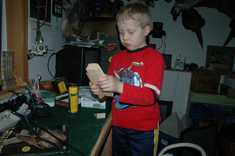 DSC_5964.JPG - Erik working on the derby car for scouts